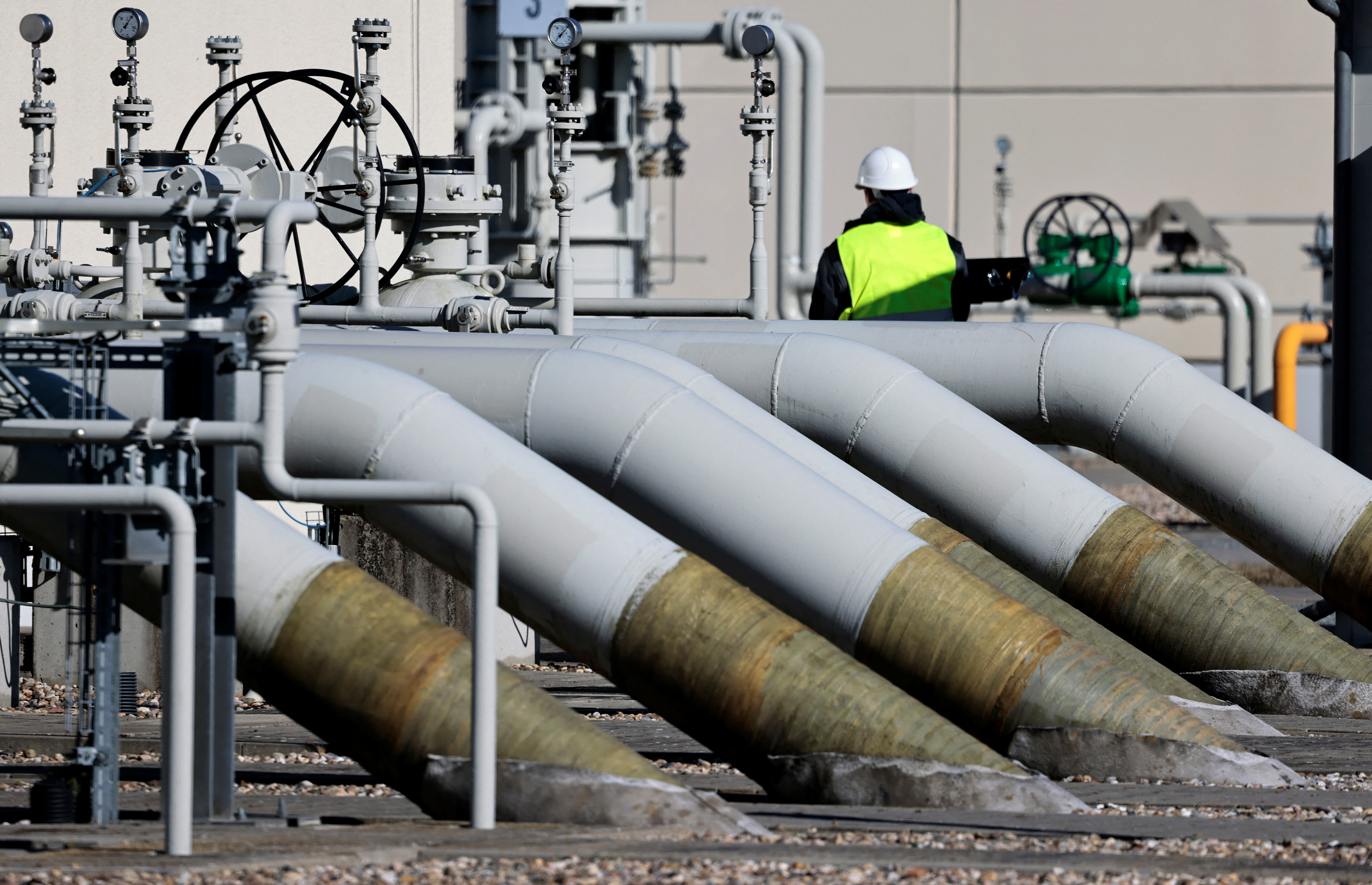 FILE PHOTO: Pipes at the landfall facilities of the 'Nord Stream 1' gas pipeline are pictured in Lubmin, Germany, March 8, 2022. REUTERS/Hannibal Hanschke